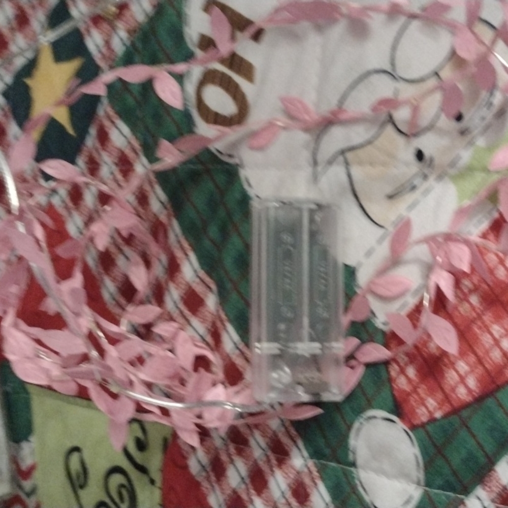 I'm selling the lights only here and these are the little pink floral wire wrap